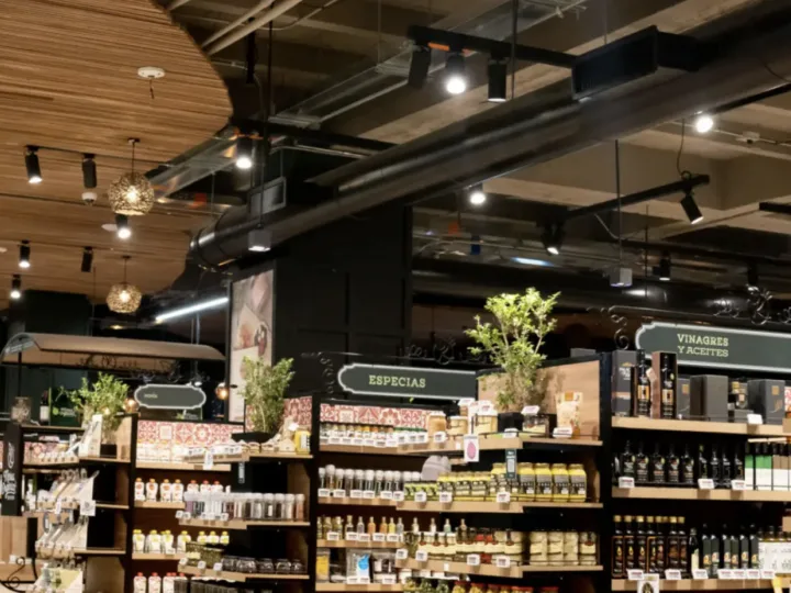 Grocery store aisles with stocked shelving