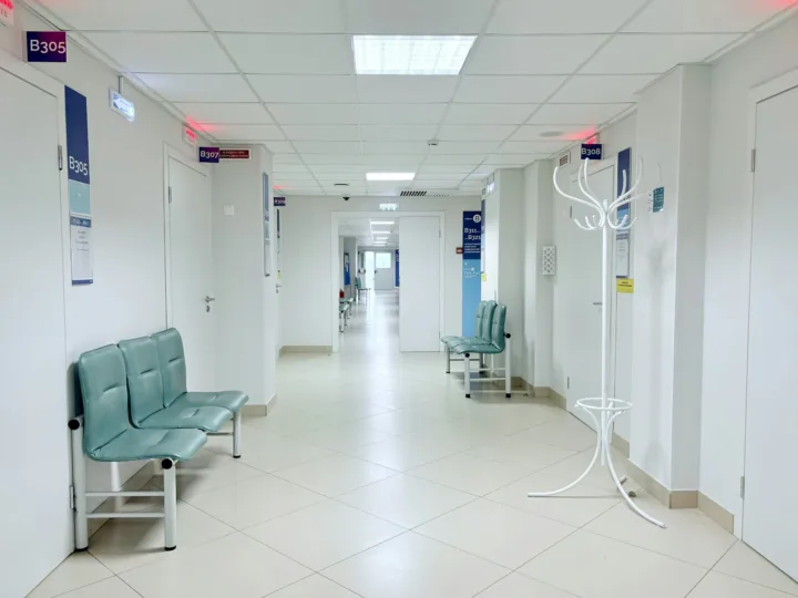 Clinic corridor with waiting area seating