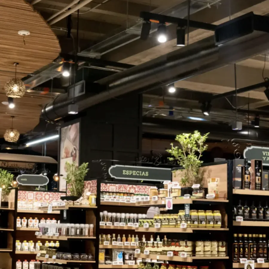 Grocery store aisles with stocked shelving